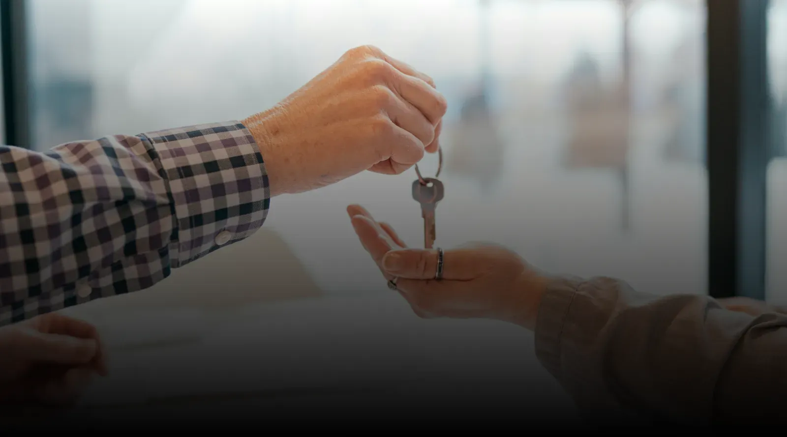 A set of keys changing hands